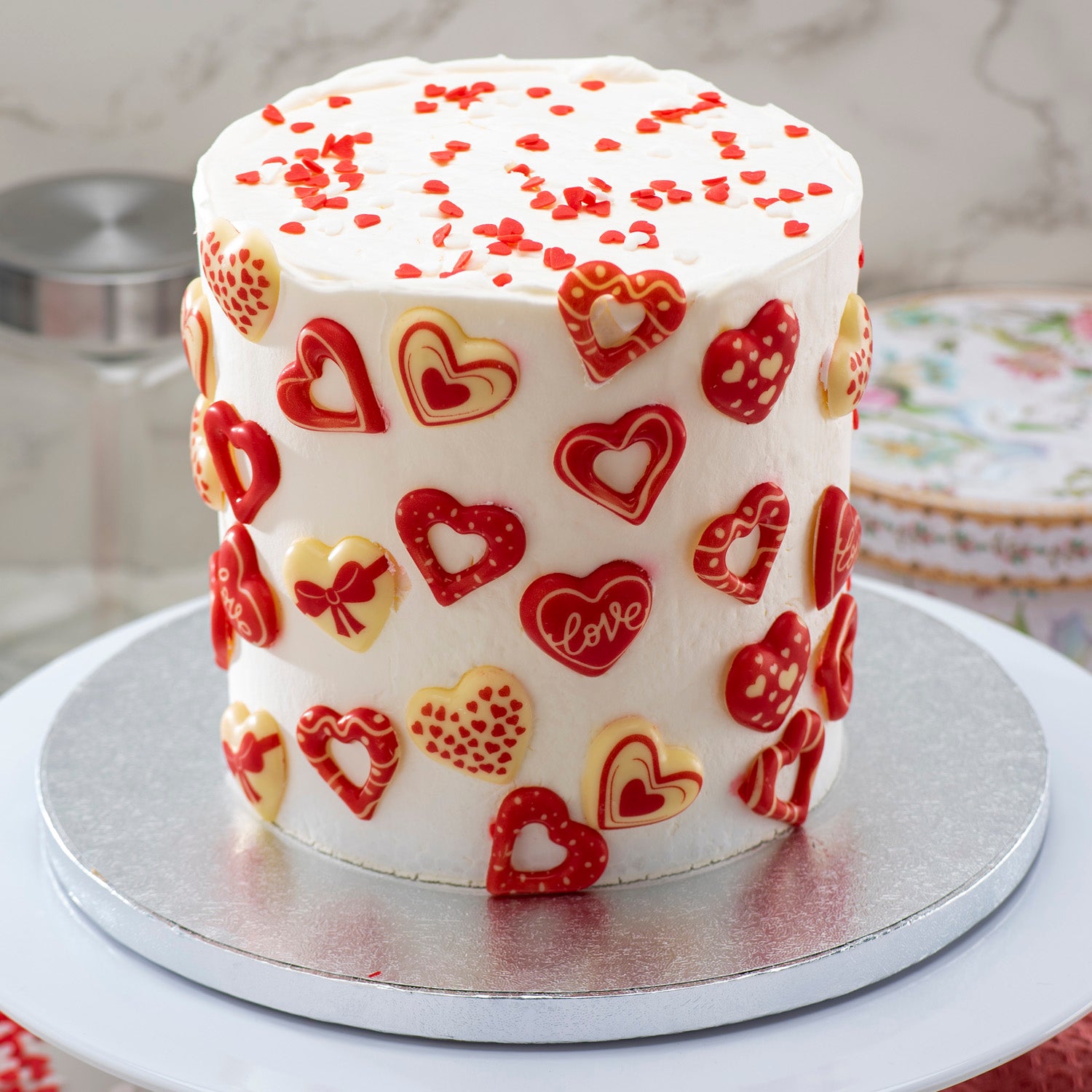 CORAÇÕES DE CHOCOLATE BRANCO SORTIDO COM FURO 33X31MM